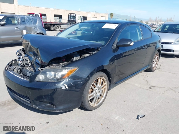 2008 Scion tC Spec with VIN JTKDE167580234717, listed as a IAAI auction lot 41980475 with 164,163 mi miles. Bid and sale history available at carsss.com. Image 2.