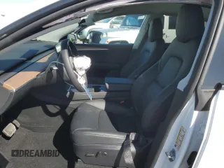 2025 Tesla Model Y Long Range with VIN 7SAYGDED2SA373756, listed as a Copart auction lot 49866835 with 3,318 mi miles and Salvage Title. Bid and sale history available at DreamBid. Image 7.