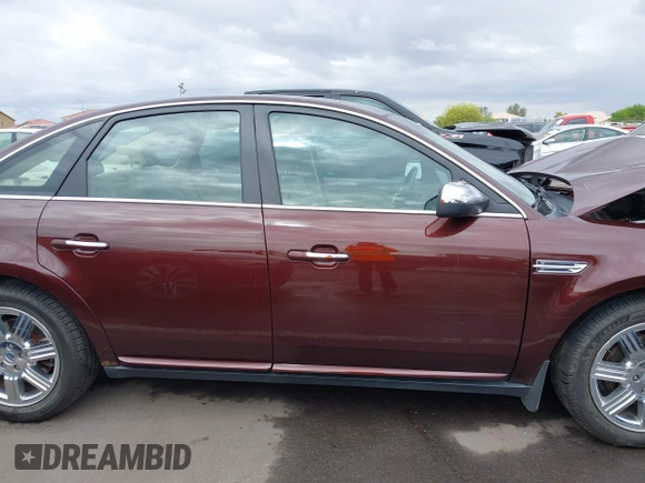 2009 Ford Taurus Limited z VIN 1FAHP25W59G115291, wystawiony jako IAAI lot #42195549 z przebiegiem 58 983 mil mil oraz . Historia ofert i sprzedaży dostępna na DreamBid. Obrazek 14.
