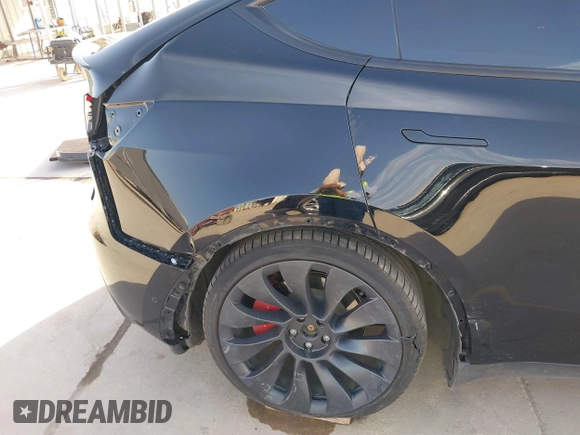 2022 Tesla Model Y Performance with VIN 7SAYGDEF6NF532027, listed as a IAAI auction lot 41717662 with 36,537 mi miles and . Bid and sale history available at DreamBid. Image 6.