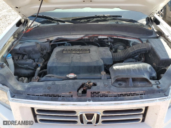 2006 Honda Ridgeline RTS with VIN 2HJYK16486H555131, listed as a Copart auction lot 69010114 with 123,861 mi miles and Salvage Title. Bid and sale history available at carsss.com. Image 12.