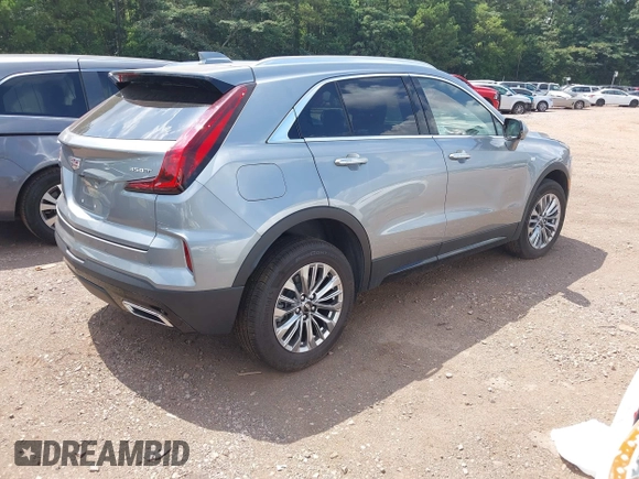 2025 Cadillac XT4 FWD Premium Luxury with VIN 1GYFZCR45SF128039, listed as a IAAI auction lot 42563517 with 18,478 mi miles and . Bid and sale history available at DreamBid. Image 4.