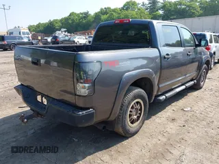 2013 Toyota Tundra z VIN 5TFDY5F18DX277032, wystawiony jako IAAI lot #42488623 z przebiegiem 287 801 mil mil oraz . Historia ofert i sprzedaży dostępna na DreamBid. Obrazek 4.