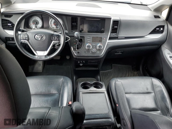 2016 Toyota Sienna SE with VIN 5TDXK3DCXGS732187, listed as a Copart auction lot 60566435 with Not provided miles and Clean title. Bid and sale history available at DreamBid. Image 8.