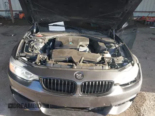 2015 BMW 4 Series 428i with VIN WBA4A5C54FG051307, listed as a IAAI auction lot 41774596 with 126,852 mi miles and . Bid and sale history available at carsss.com. Image 10.