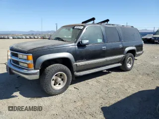 1999 Chevrolet Suburban with VIN 1GNGK26R5XJ513945, listed as a Copart auction lot 73673314 with 198,656 mi miles and Clean Title. Bid and sale history available at carsss.com. Image 1.