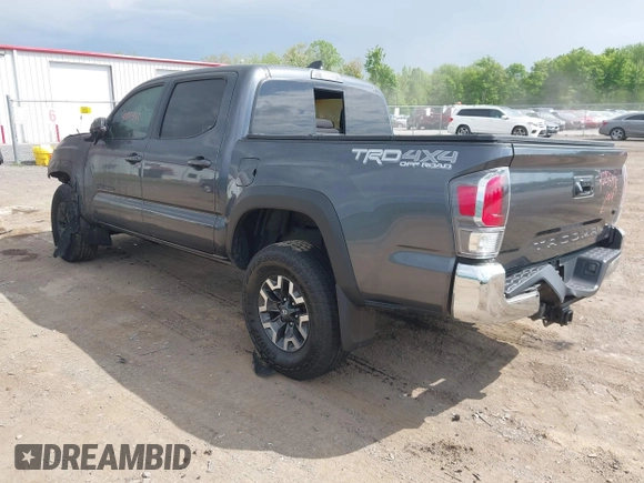 2023 Toyota Tacoma SR with VIN 3TMCZ5AN0PM636306, listed as a IAAI auction lot 42255935 with 14,131 mi miles and . Bid and sale history available at DreamBid. Image 3.