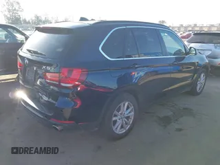 2015 BMW X5 xDrive35i with VIN 5UXKR0C53F0K62348, listed as a IAAI auction lot 41969164 with 122,612 mi miles. Bid and sale history available at carsss.com. Image 4.