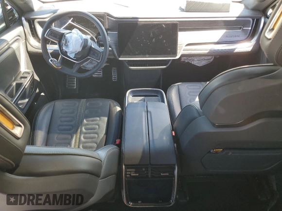 2024 Rivian R1S Adventure z VIN 7PDSGABA7RN034025, wystawiony jako Copart lot #49332795 z przebiegiem Nie podano mil oraz Szkody całkowita. Historia ofert i sprzedaży dostępna na DreamBid. Obrazek 8.