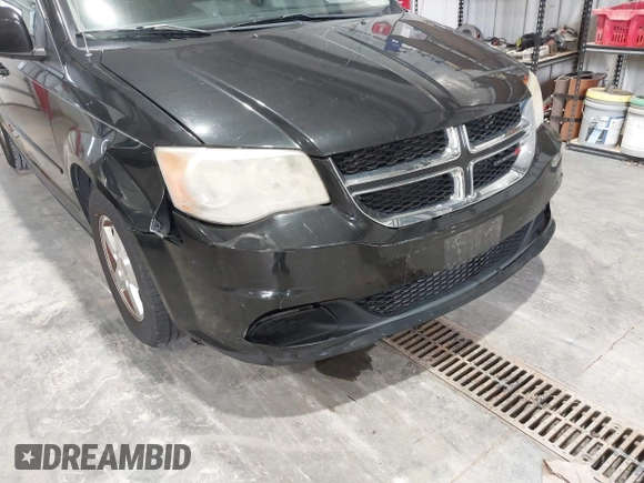 2013 Dodge Grand Caravan SXT with VIN 2C4RDGCG2DR527482, listed as a IAAI auction lot 42199622 with 198,248 mi miles and . Bid and sale history available at DreamBid. Image 6.