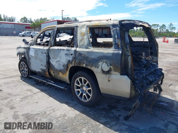 2015 GMC Yukon Denali with VIN 1GKS2CKJXFR655818, listed as a IAAI auction lot 41641960 with 1 mi miles. Bid and sale history available at carsss.com. Image 3.