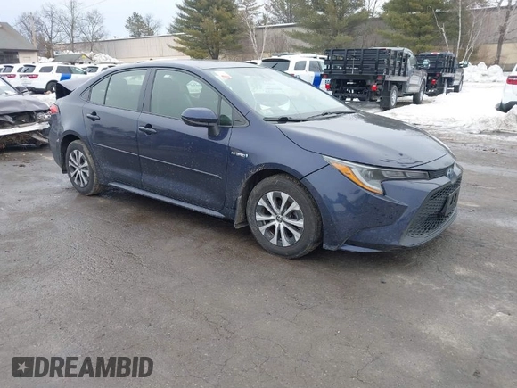 2021 Toyota Corolla Hybrid LE with VIN JTDEAMDE2MJ030035, listed as a IAAI auction lot 41644662 with 130,693 mi miles. Bid and sale history available at carsss.com. Image 1.