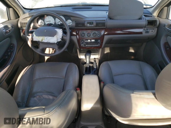 2002 Chrysler Sebring Touring with VIN 1C3AL56R52N240265, listed as a Copart auction lot 77464884 with 119,105 mi miles and Salvage title. Bid and sale history available at DreamBid. Image 8.