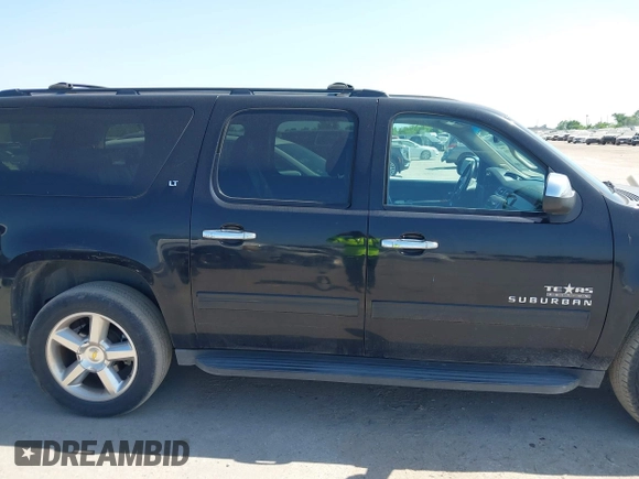 2011 Chevrolet Suburban LT with VIN 1GNSCJE09BR235355, listed as a IAAI auction lot 42030105 with 308,576 mi miles. Bid and sale history available at carsss.com. Image 13.