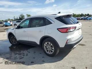 2021 Ford Escape SE with VIN 1FMCU0G66MUA33509, listed as a Copart auction lot 63328815 with 67,219 mi miles and Salvage title. Bid and sale history available at DreamBid. Image 2.