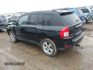 2015 Jeep Compass High Altitude Edition with VIN 1C4NJDEB9FD396502, listed as a IAAI auction lot 41757194 with 157,928 mi miles. Bid and sale history available at carsss.com. Image 3.