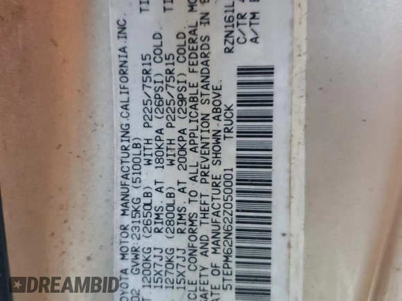 2002 Toyota Tacoma with VIN 5TEPM62N62Z050001, listed as a Copart auction lot 41335185 with 199,316 mi miles and Salvage title. Bid and sale history available at DreamBid. Image 12.