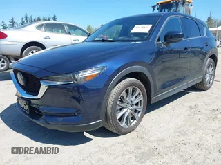 2019 Mazda CX-5 Signature with VIN JM3KFBEY7K0589236, listed as a IAAI auction lot 42078418 with 86,959 mi miles. Bid and sale history available at carsss.com. Image 17.