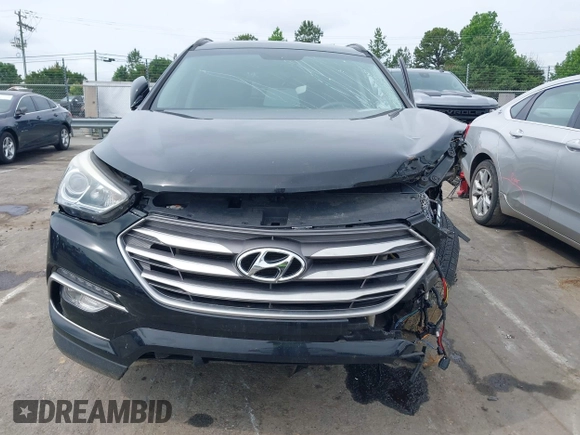 2017 Hyundai Santa Fe 2.4L with VIN 5NMZUDLB0HH037142, listed as a IAAI auction lot 42323880 with 87,396 mi miles and . Bid and sale history available at DreamBid. Image 6.