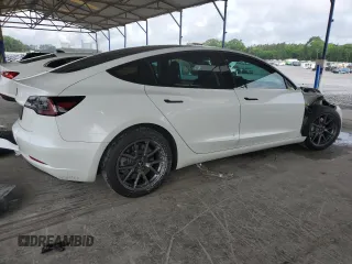 2023 Tesla Model 3 z VIN 5YJ3E1EA1PF543214, wystawiony jako Copart lot #53953185 z przebiegiem 41 701 mil mil oraz Szkoda całkowita • Salvage title. Historia ofert i sprzedaży dostępna na DreamBid. Obrazek 3.
