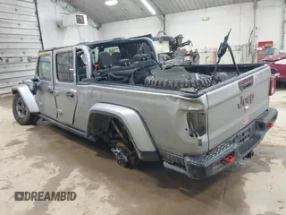 2020 Jeep Gladiator Rubicon with VIN 1C6JJTBGXLL136627, listed as a IAAI auction lot 42333468 with 74,717 mi miles and . Bid and sale history available at DreamBid. Image 3.