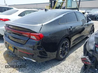 2022 Kia K5 GT-Line z VIN 5XXG64J2XNG095158, wystawiony jako IAAI lot #42163963 z przebiegiem 59 756 mil mil oraz . Historia ofert i sprzedaży dostępna na DreamBid. Obrazek 4.