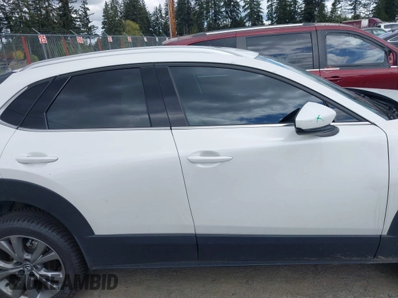 2023 Mazda CX-30 2.5 S Premium Package with VIN 3MVDMBDM7PM522287, listed as a IAAI auction lot 42052660 with 41,336 mi miles. Bid and sale history available at carsss.com. Image 13.