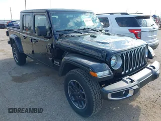 2023 Jeep Gladiator Overland z VIN 1C6HJTFG2PL552850, wystawiony jako IAAI lot #42495345 z przebiegiem 52 011 mil mil oraz . Historia ofert i sprzedaży dostępna na DreamBid. Obrazek 1.