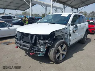 2015 Jeep Grand Cherokee Limited with VIN 1C4RJFBM6FC117970, listed as a IAAI auction lot 41744862 with 137,983 mi miles. Bid and sale history available at carsss.com. Image 2.