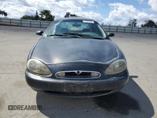 1997 Mercury Sable GS z VIN 1MELM50U1VA620597, wystawiony jako Copart lot #51635765 z przebiegiem 250 824 mil mil oraz Szkoda całkowita • Salvage title. Historia ofert i sprzedaży dostępna na DreamBid. Obrazek 5.