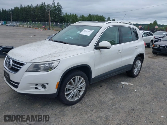 2010 Volkswagen Tiguan with VIN WVGBV9AX2AW513478, listed as a IAAI auction lot 42607466 with 63,780 mi miles and . Bid and sale history available at DreamBid. Image 2.
