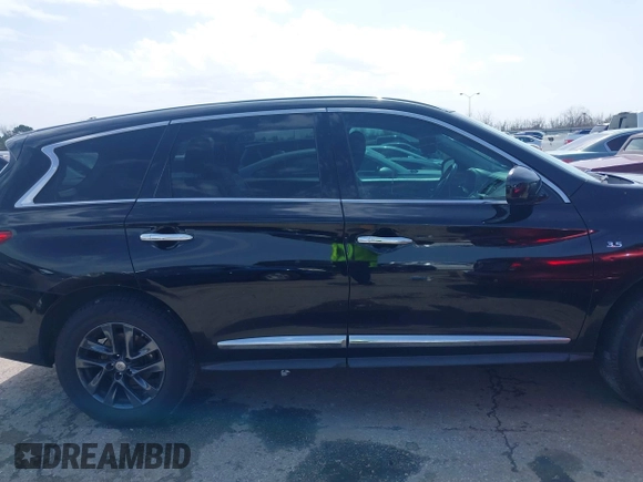 2015 Infiniti QX60 with VIN 5N1AL0MN6FC522202, listed as a IAAI auction lot 41713786 with 206,448 mi miles and . Bid and sale history available at DreamBid. Image 13.