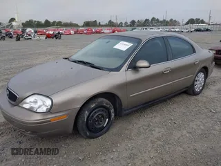 2003 Mercury Sable GS z VIN 1MEFM50U33A606937, wystawiony jako IAAI lot #41058899 z przebiegiem 138 479 mil mil oraz . Historia ofert i sprzedaży dostępna na DreamBid. Obrazek 2.