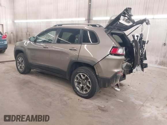 2021 Jeep Cherokee Trailhawk z VIN 1C4PJMBX5MD231018, wystawiony jako IAAI lot #42029850 z przebiegiem 66 525 mil mil oraz . Historia ofert i sprzedaży dostępna na DreamBid. Obrazek 3.