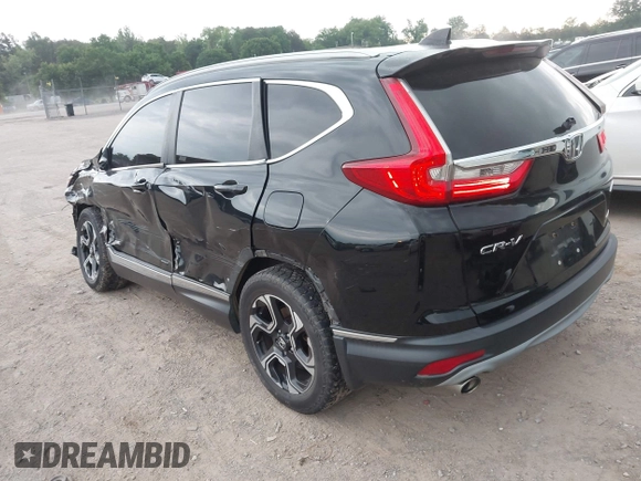 2017 Honda CR-V Touring with VIN 2HKRW2H96HH672017, listed as a IAAI auction lot 42151118 with 144,527 mi miles and . Bid and sale history available at carsss.com. Image 3.