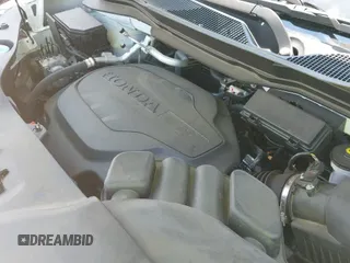 2022 Honda Pilot Touring 8-Passenger with VIN 5FNYF5H96NB004676, listed as a IAAI auction lot 42636581 with 23,428 mi miles and . Bid and sale history available at DreamBid. Image 19.