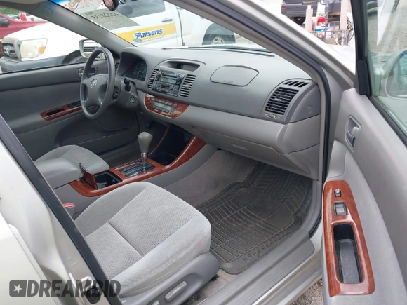 2003 Toyota Camry LE with VIN 4T1BE30K13U168509, listed as a IAAI auction lot 42220735 with 210,328 mi miles and . Bid and sale history available at DreamBid. Image 5.