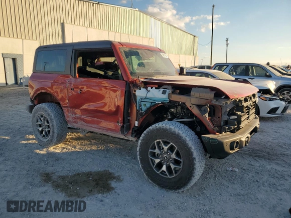 2023 Ford Bronco with VIN 1FMDE5CP0PLC17366, listed as a Copart auction lot 83611284 with 3,596 mi miles and Salvage title. Bid and sale history available at DreamBid. Image 4.