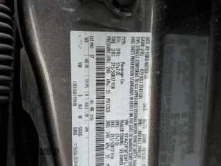 2015 Ford Focus SE z VIN 1FADP3F29FL340350, wystawiony jako Copart lot #53466455 z przebiegiem 146 374 mil mil oraz Szkoda całkowita • Salvage title. Historia ofert i sprzedaży dostępna na DreamBid. Obrazek 14.