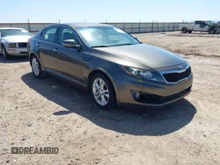2013 Kia Optima LX with VIN 5XXGM4A74DG093454, listed as a IAAI auction lot 42004990 with 176,667 mi miles. Bid and sale history available at carsss.com. Image 1.