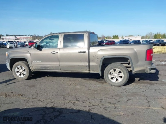 2015 GMC Sierra 1500 SLE with VIN 3GTU2UEC2FG309656, listed as a IAAI auction lot 41922877 with 194,339 mi miles. Bid and sale history available at carsss.com. Image 14.