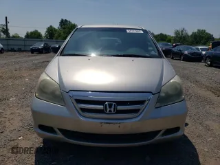2007 Honda Odyssey LX with VIN 5FNRL38287B054504, listed as a Copart auction lot 59141665 with 128,617 mi miles and Salvage title. Bid and sale history available at DreamBid. Image 5.