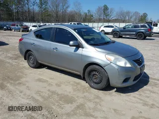 2012 Nissan Versa S with VIN 3N1CN7APXCL868911, listed as a IAAI auction lot 41762670 with 228,177 mi miles. Bid and sale history available at carsss.com. Image 1.