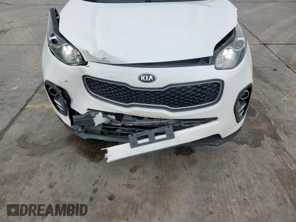 2019 Kia Sportage EX z VIN KNDPN3AC0K7559133, wystawiony jako Copart lot #51867755 z przebiegiem 64 867 mil mil oraz Szkoda całkowita • Salvage title. Historia ofert i sprzedaży dostępna na DreamBid. Obrazek 14.