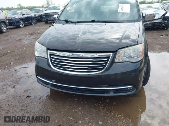 2014 Chrysler Town & Country Touring L with VIN 2C4RC1CG5ER378194, listed as a IAAI auction lot 42176454 with 178,448 mi miles and . Bid and sale history available at carsss.com. Image 12.
