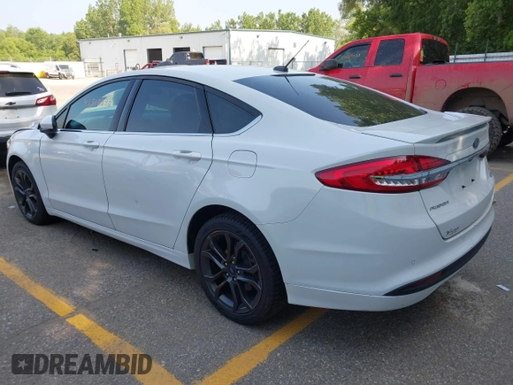 2018 Ford Fusion SE with VIN 3FA6P0HD7JR230705, listed as a IAAI auction lot 42518890 with 114,988 mi miles and . Bid and sale history available at DreamBid. Image 3.