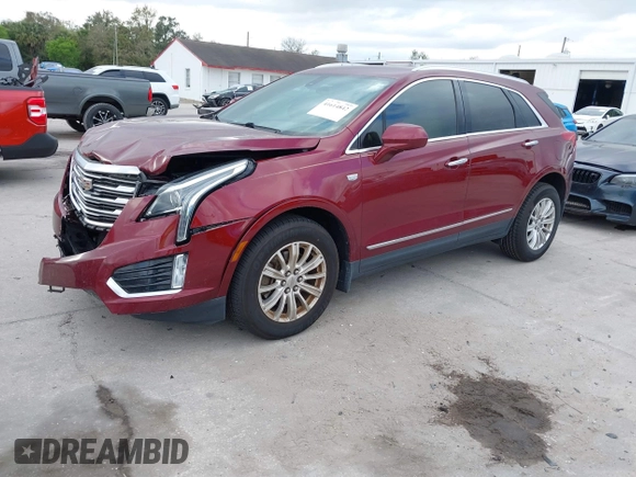 2017 Cadillac XT5 FWD with VIN 1GYKNARS2HZ107587, listed as a IAAI auction lot 41614842 with 124,611 mi miles and . Bid and sale history available at carsss.com. Image 17.