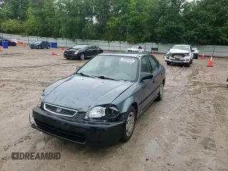 1997 Honda Civic LX z VIN 2HGEJ6676VH507855, wystawiony jako Copart lot #56684455 z przebiegiem 185 498 mil mil oraz Szkoda całkowita • Salvage title. Historia ofert i sprzedaży dostępna na DreamBid. Obrazek 13.