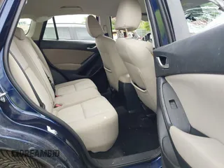 2013 Mazda CX-5 Sport with VIN JM3KE2BE1D0160254, listed as a IAAI auction lot 42256555 with 136,476 mi miles and . Bid and sale history available at DreamBid. Image 8.