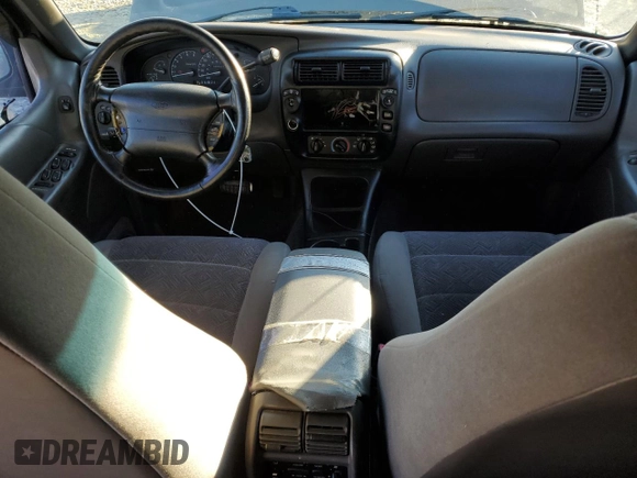 1999 Ford Explorer XL with VIN 1FMZU34X8XUC31019, listed as a Copart auction lot 87831635 with 220,683 mi miles and Salvage title. Bid and sale history available at DreamBid. Image 8.
